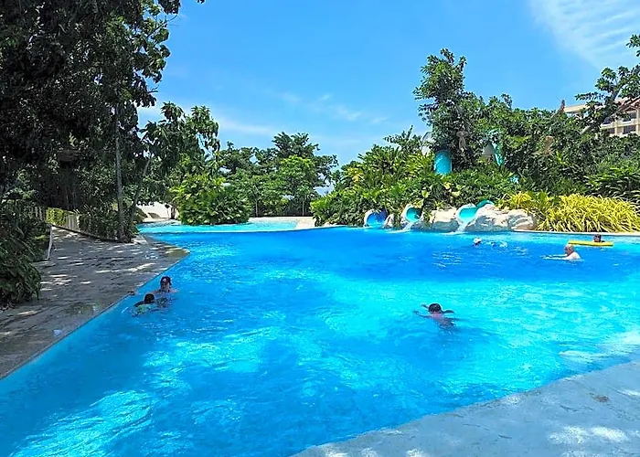 Chic Cozy At Tambuli Residences Ocean View By Dominik With Pool Balcony In Mactan Hotel